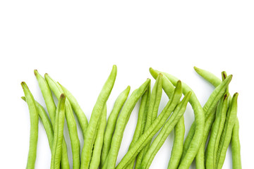 fresh green beans on a white background with copy space