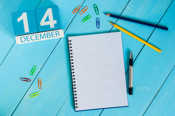 December 14th. Day 14 of month, calendar on Engineer workplace background. Winter time. Empty space...