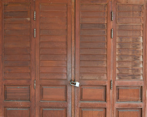 padlock and old door hasp and door on an vintage
