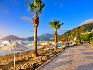 Seafront against the backdrop of the picturesque bay of blue sea and mountains. Marmaris. Turkey