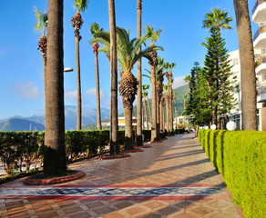 Fototapeta premium Seafront against the backdrop of the picturesque bay of blue sea and mountains. Marmaris. Turkey