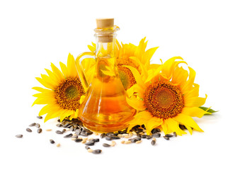 Sunflower oil with flowers and by seed on white background