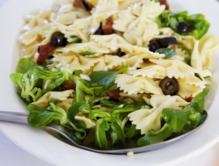 Cold pasta in white plate