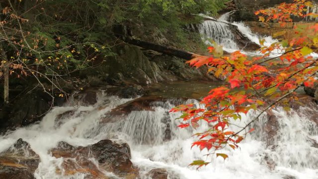 Unnamed waterfall on a creek in Northfield, Vermont; includes ambient sound.