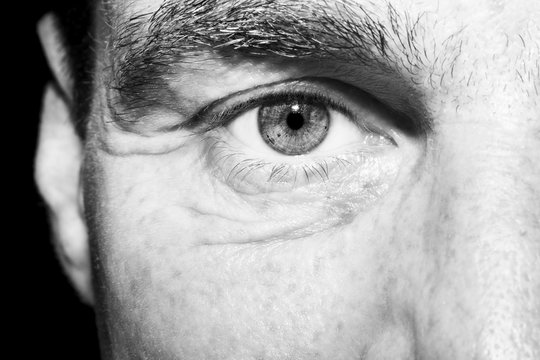 Image of man's monochrome  eye close up.