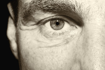 Image of man's vintage  eye close up.