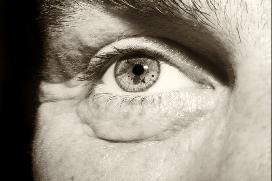 Image of man's vintage eye close up.
