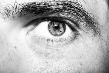 Obraz premium Image of man's eye close up.