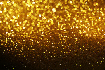 black and gold glitter bokeh texture abstract background