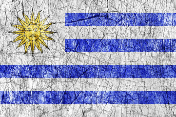 Fototapeta na wymiar Grudge stone painted Uruguay flag