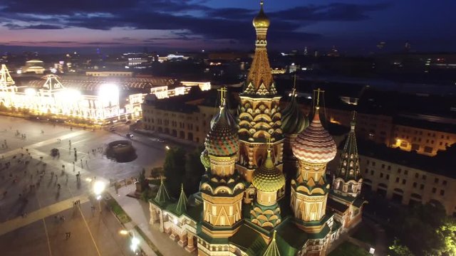 Saint Basil's Cathedral flight around. Best unique night flight close to Moscow Kremlin and Red Square. Evening embankment road traffic. City illumination. 4k footage. Aerial drone quadcopter.
