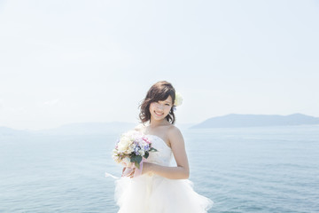 Fototapeta na wymiar ビーチの花嫁