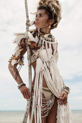 Attractive wild boho woman at beach © zolotareva_elina