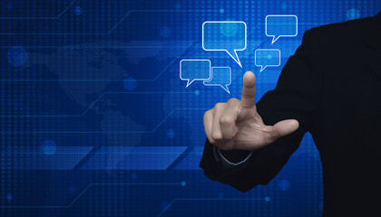 Businessman point to social chat sign and speech bubbles over di