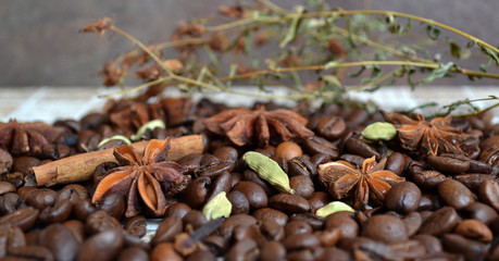 Coffee beans and flavoring background.