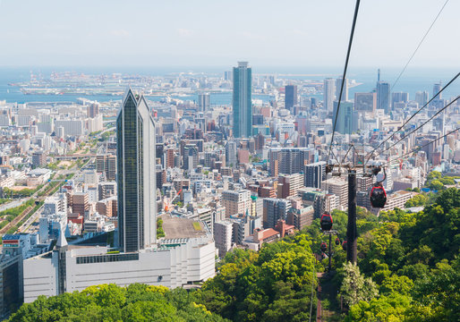 Kobe cityscape skyline and port with cable car view from mountai