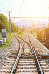 Obraz premium Railway tracks switching direction to Detroit destination