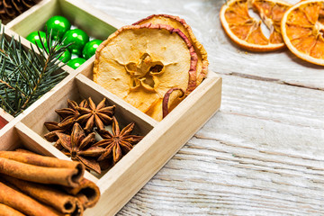 Christmas background with spices in a wooden box