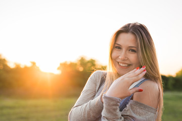 beautiful portrait of carefree friendly approachable girl with a stunning smile and cute looks