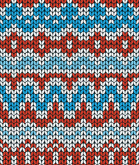 Red and blue Christmas seamless pattern. Knitting  traditional texture.   Winter background. Vector illustration.