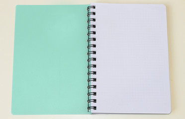 Blank spiral notebook Notepad, pencil . Display layout for branding and promotion of the objects. School supplies. To make notes.