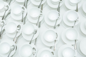 Abstract blurred of many rows coffee or tea cups