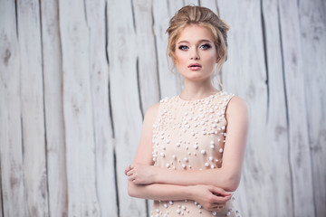 Fototapeta premium young beautiful bride with make-up and styling