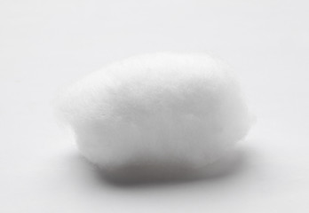 Medical cotton wool ball on white background