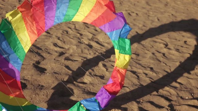 Floating multi-colored parachute