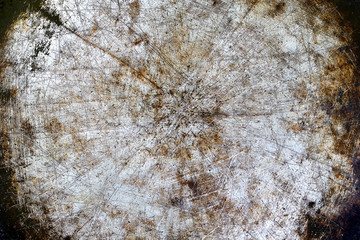 Rustic metal background with with scratches and cuts; grunge industrial background