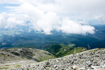 rocky mountain landscape covered with clouds