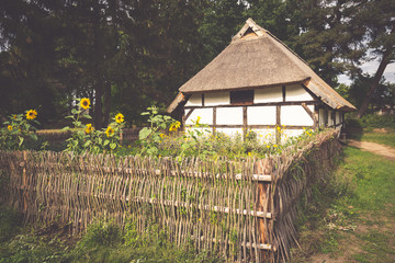 Fototapeta na wymiar Traditional thatched house Kluki Poland