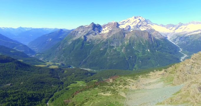 Aerial 4k - Valmalenco (IT) - Vista panoramica della Valmalenco - Chiareggio e Monte Disgrazia