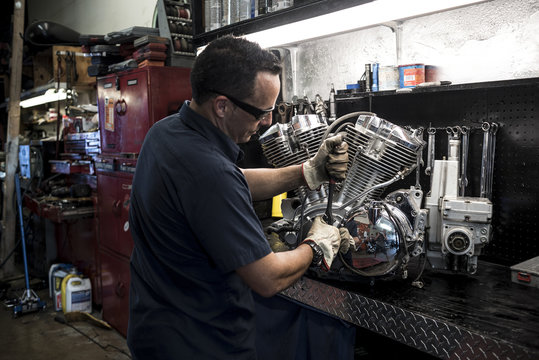 Motorcycle mechanic working
