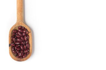 Brazilian Red Beans into a spoon. Phaseolus vulgaris