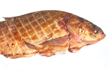 Large smoked carp isolated on white background