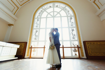 Big window and a lovely couple
