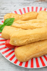 Fried bread sticks  on wooden table