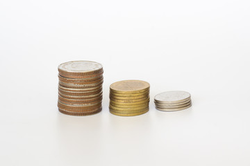 Coin stacks on a white background.
