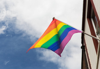 close up of rainbow gay pride flag waving outdoors
