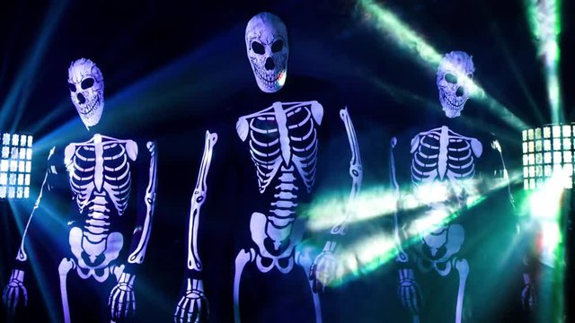 three funky disco skeleton Halloween cool dance
