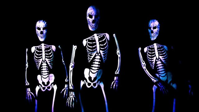 three funky disco skeleton Halloween cool dance