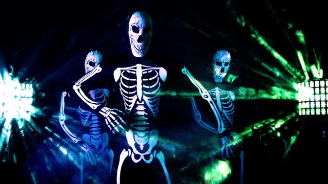 three funky disco skeleton Halloween cool dance