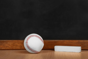Tennis ball on blackboard background