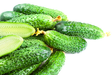 ..Heap of Fresh Cucumber isolated over white background close up