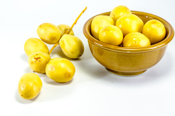 Group of fresh date palm fruits  on white background