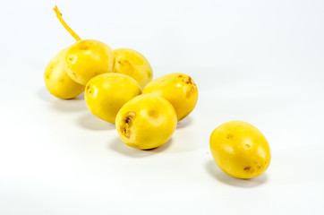 Group of fresh date palm fruits  on white background