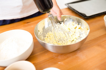 Mixing the butter in bowl