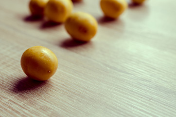 fresh date palm fruits  on wooden background: Vintage style