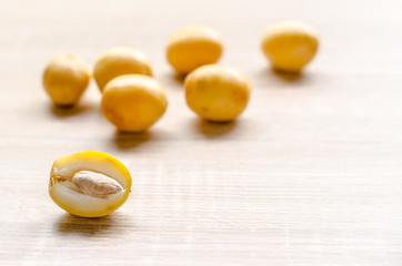 fresh date palm fruits  on wooden background